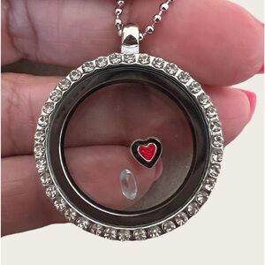 Elegant stainless steel locket Pendant & Necklace an aquamarine stone inside